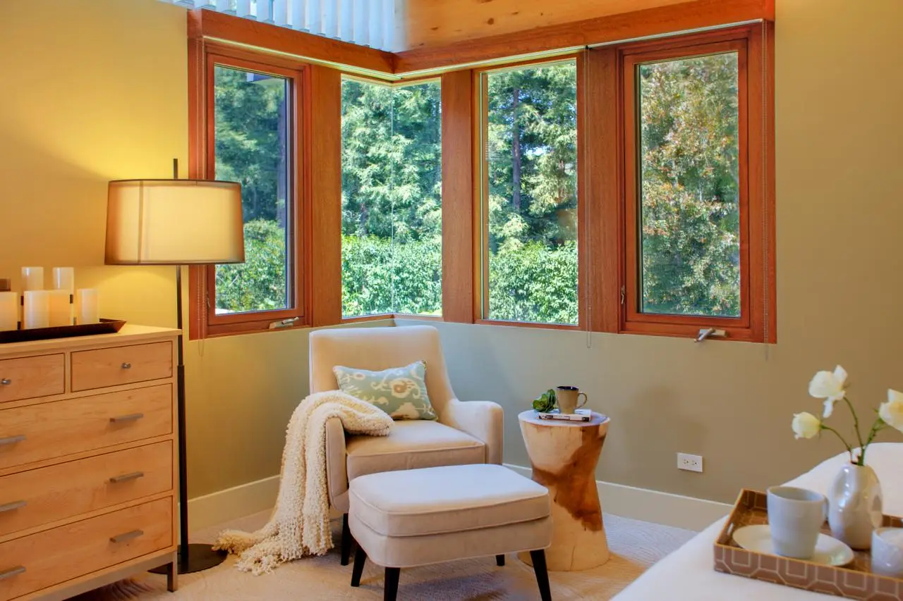 reader's nook with wide corner windows