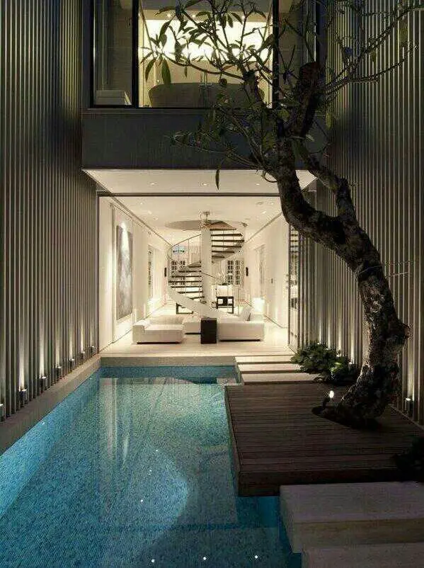 narrow pool with mosaic tiling