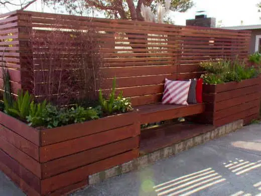 wood garden fence with seating