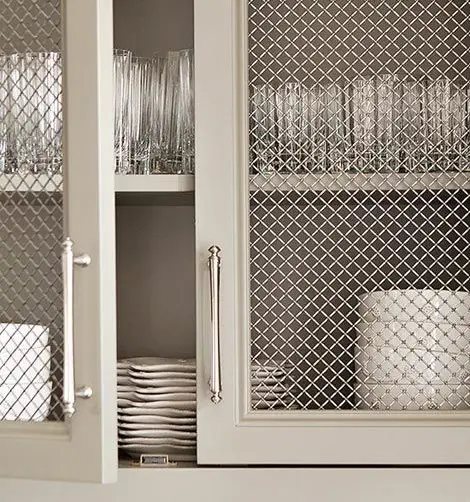 kitchen cabinet with metallic screen doors