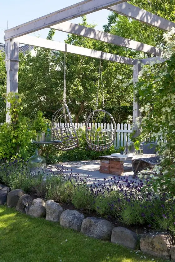 patio pergola with swings
