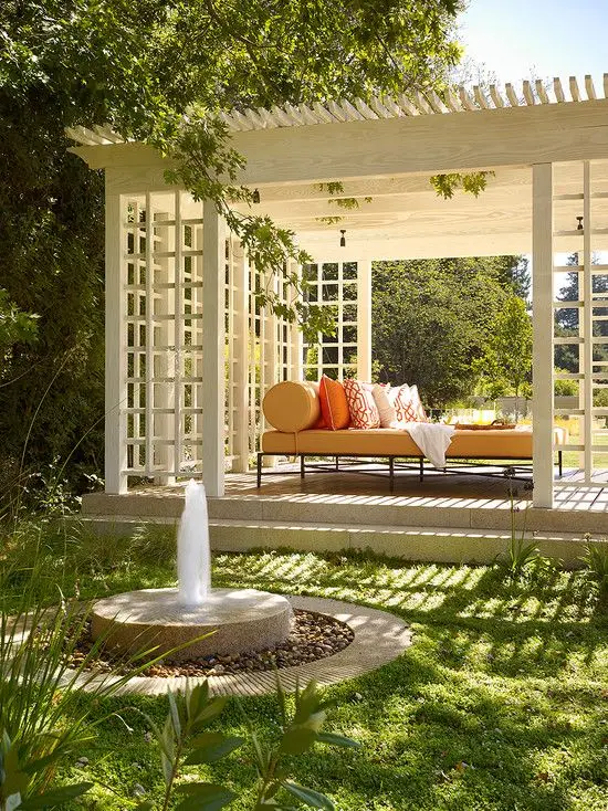 white pergola with latticed sides