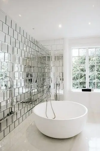 white bathroom with mirror wall