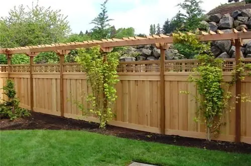 wood fence with arbour