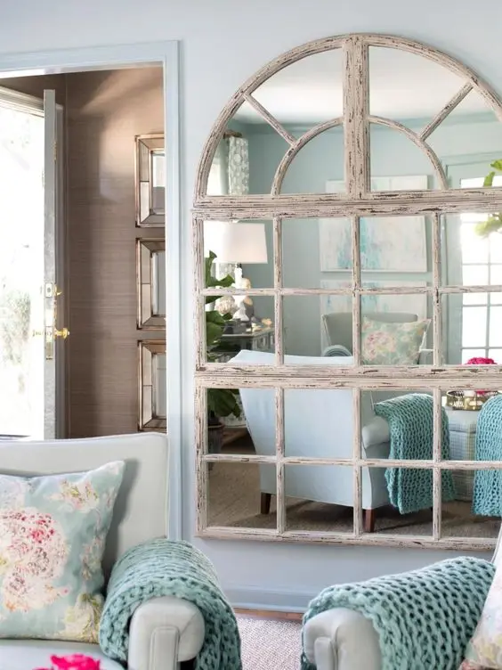 framed mirrors in living room