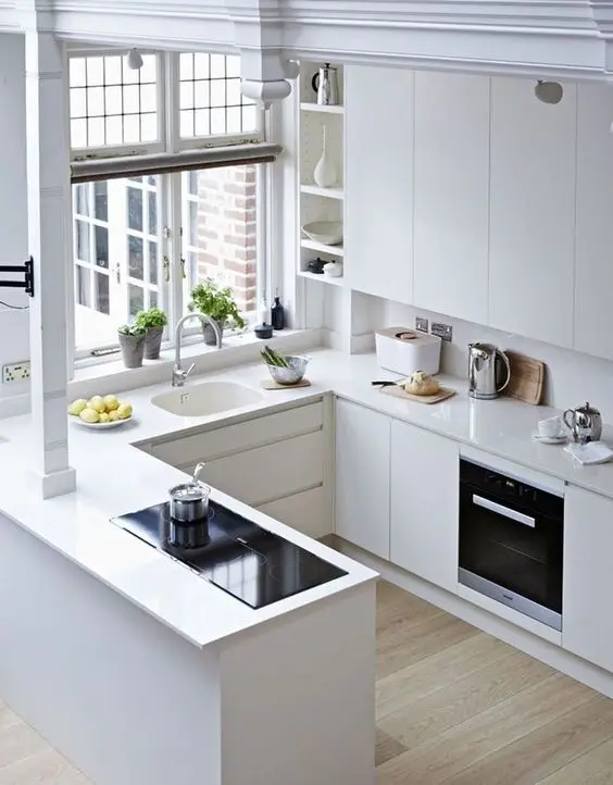 all white apartment kitchen
