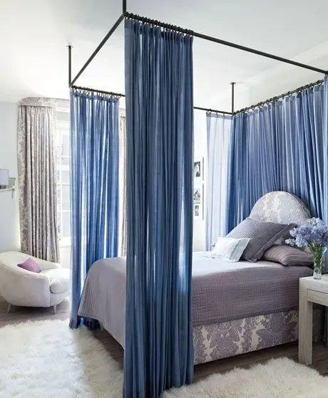 bed with canopy curtains