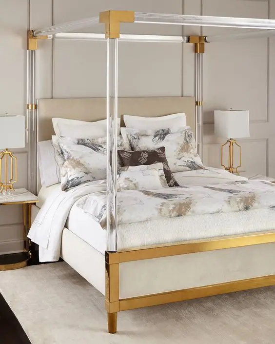glass and brass four poster bed