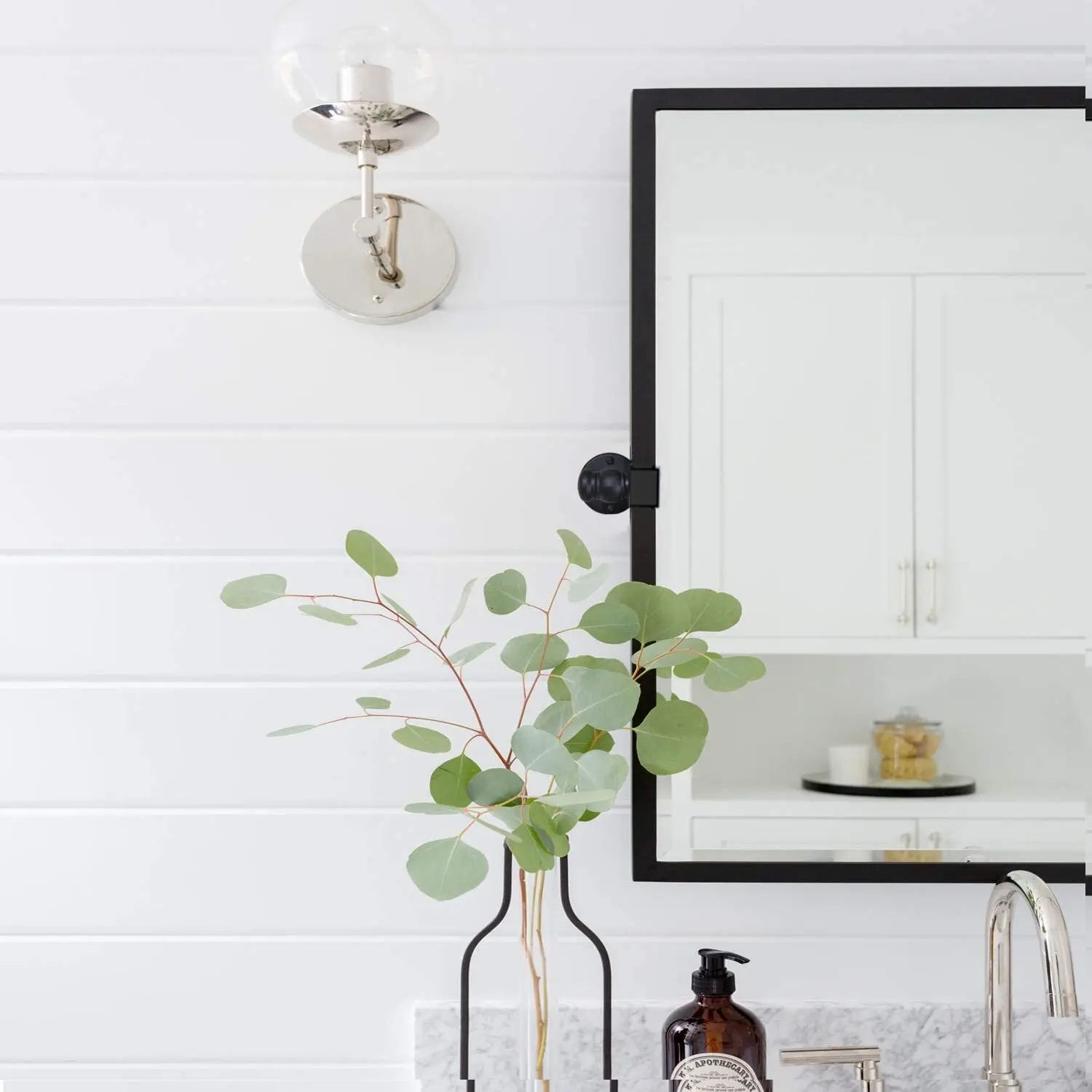 tilting bathroom mirror